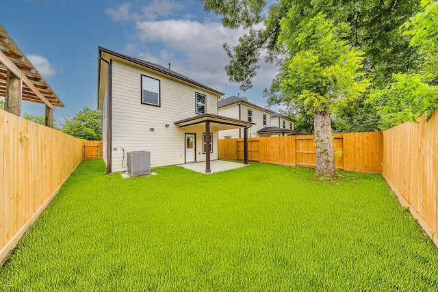 10512 Exeter St, Houston, TX 77093 - back of property with a patio area and a fenced backyard