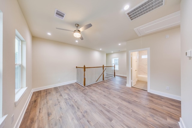 10512 Exeter St, Houston, TX 77093 - unfurnished room featuring attic access, wood finished floors, recessed lighting, and ceiling fan