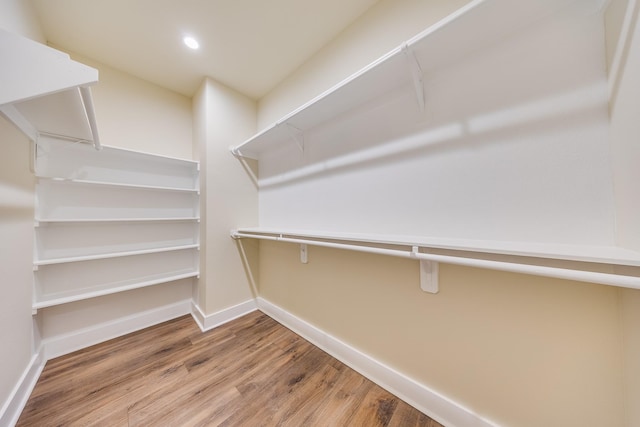 10512 Exeter St, Houston, TX 77093 - walk in closet with wood finished floors