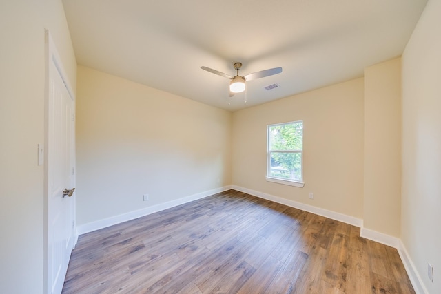 10512 Exeter St, Houston, TX 77093 - unfurnished room featuring wood finished floors and a ceiling fan