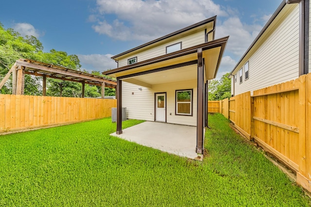10512 Exeter St, Houston, TX 77093 - back of property with a patio area and a fenced backyard
