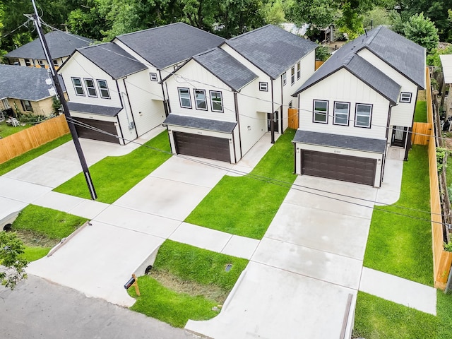 10512 Exeter St, Houston, TX 77093 - modern inspired farmhouse with board and batten siding, a garage, concrete driveway, and a shingled roof