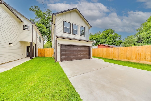10512 Exeter St, Houston, TX 77093 - view of front of home featuring board and batten siding, a garage, and concrete driveway