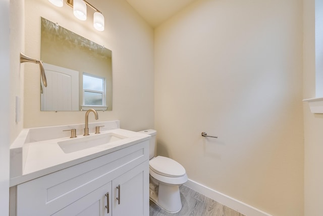 10512 Exeter St, Houston, TX 77093 - half bathroom with vanity and wood finished floors