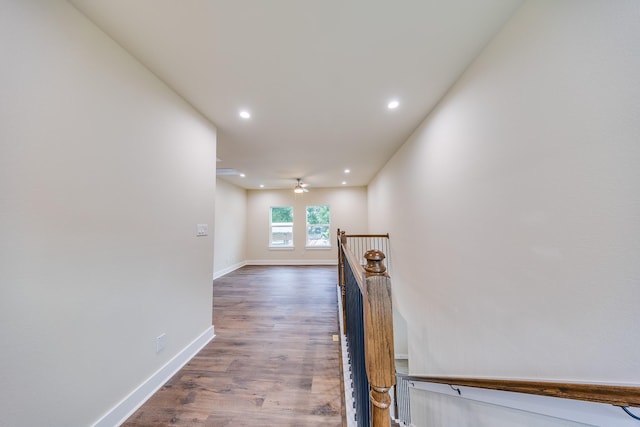 10512 Exeter St, Houston, TX 77093 - corridor with wood finished floors, recessed lighting, and an upstairs landing