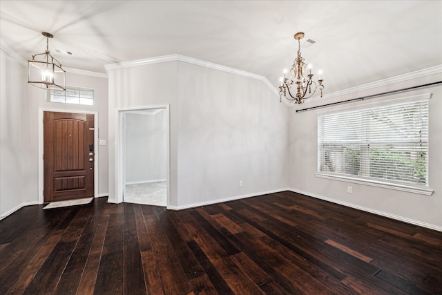 31703 Morning Ridge Ln, Spring, TX 77386 - foyer with a chandelier, dark wood finished floors, and crown molding