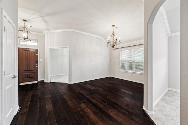 31703 Morning Ridge Ln, Spring, TX 77386 - entrance foyer featuring a chandelier, healthy amount of natural light, hardwood / wood-style floors, and ornamental molding