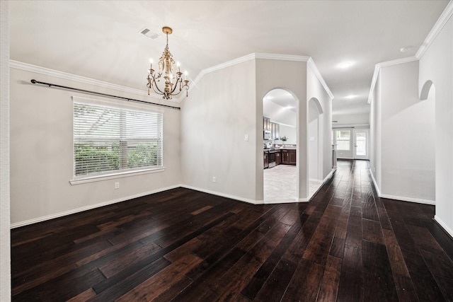 31703 Morning Ridge Ln, Spring, TX 77386 - spare room featuring wood-type flooring, arched walkways, a chandelier, and crown molding