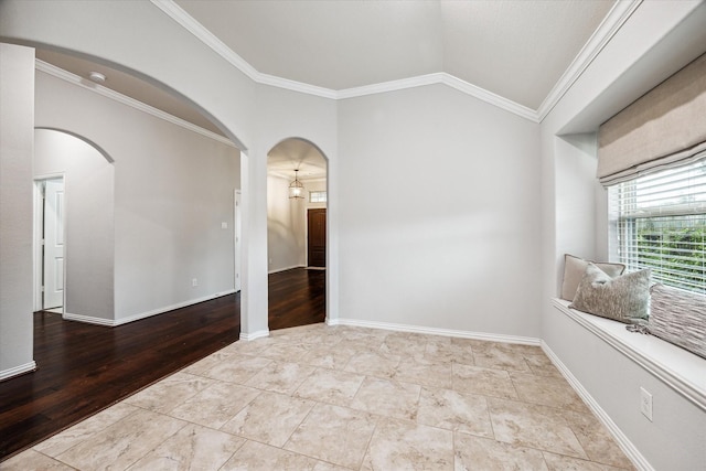31703 Morning Ridge Ln, Spring, TX 77386 - unfurnished room with arched walkways, vaulted ceiling, ornamental molding, and wood finished floors