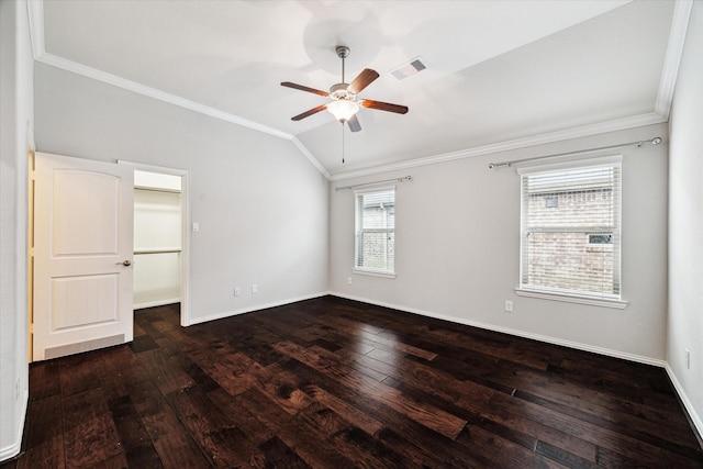 31703 Morning Ridge Ln, Spring, TX 77386 - unfurnished bedroom featuring ornamental molding, vaulted ceiling, hardwood / wood-style floors, a walk in closet, and ceiling fan