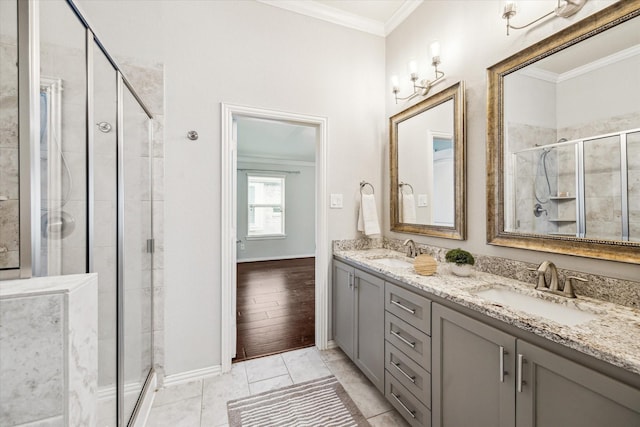 31703 Morning Ridge Ln, Spring, TX 77386 - full bathroom with ornamental molding, double vanity, and a stall shower