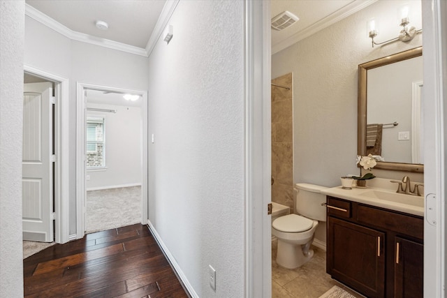 31703 Morning Ridge Ln, Spring, TX 77386 - full bathroom featuring vanity, ornamental molding, and wood-type flooring