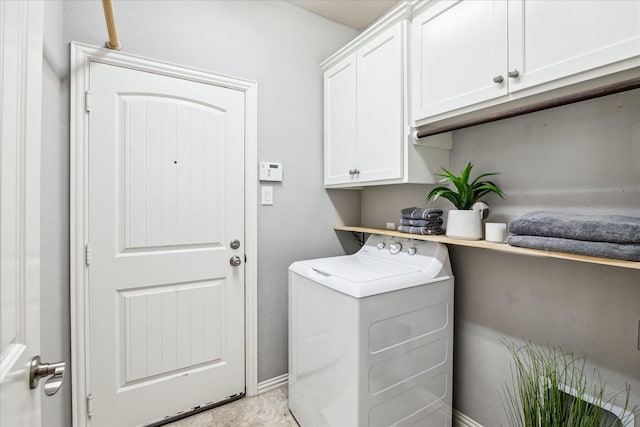 31703 Morning Ridge Ln, Spring, TX 77386 - washroom with washer / dryer and cabinet space