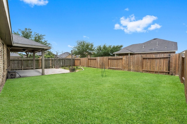 31703 Morning Ridge Ln, Spring, TX 77386 - fenced backyard with a patio area and a ceiling fan