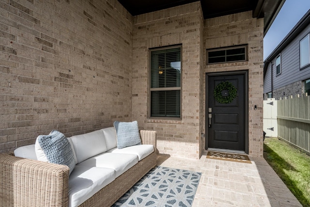 17746 Tree Of Heaven, Conroe, TX 77385 - property entrance featuring outdoor lounge area and brick siding