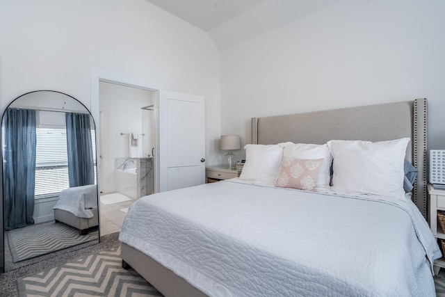 17746 Tree Of Heaven, Conroe, TX 77385 - bedroom with high vaulted ceiling, ensuite bath, and carpet