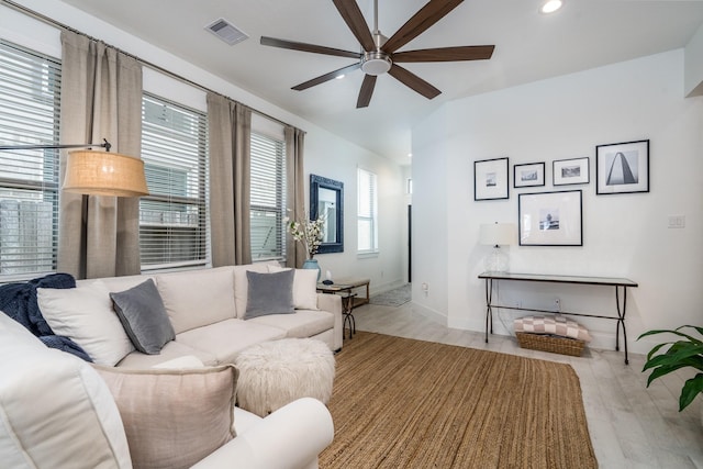 17746 Tree Of Heaven, Conroe, TX 77385 - living room featuring a ceiling fan and light wood-type flooring