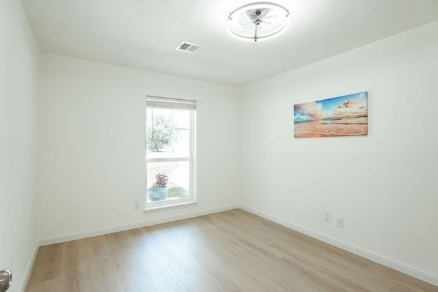 28926 Twisted Oak Dr, Shenandoah, TX 77381 - empty room featuring light wood finished floors and baseboards