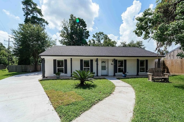 28926 Twisted Oak Dr, Shenandoah, TX 77381 - ranch-style house with a porch, concrete driveway, and brick siding