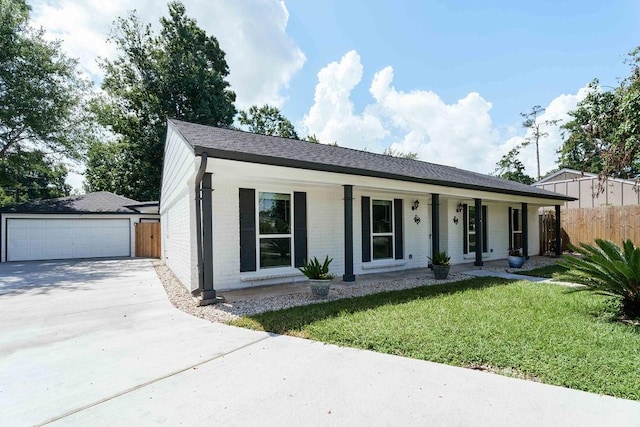 28926 Twisted Oak Dr, Shenandoah, TX 77381 - ranch-style house featuring brick siding, a porch, a detached garage, and roof with shingles