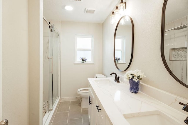 28926 Twisted Oak Dr, Shenandoah, TX 77381 - full bath with double vanity, a shower stall, and tile patterned flooring