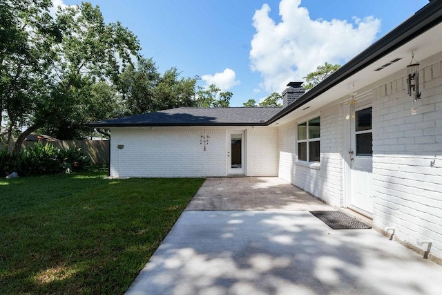 28926 Twisted Oak Dr, Shenandoah, TX 77381 - entrance to property featuring a patio area, a chimney, and brick siding