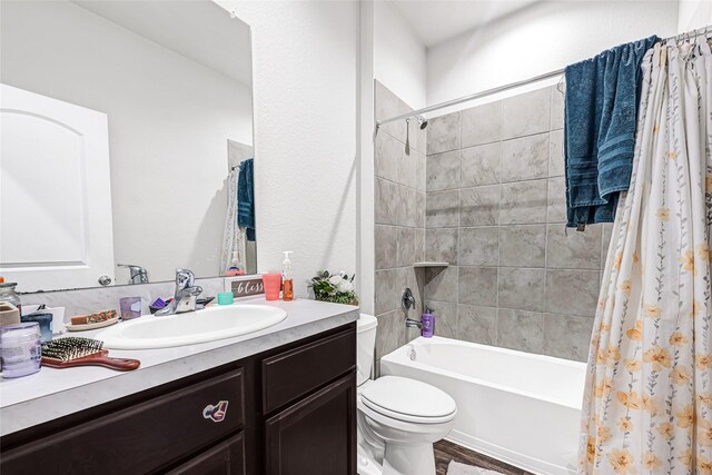 2435 Palmer Lake Ln, Spring, TX 77373 - bathroom with vanity and shower / bathtub combination with curtain