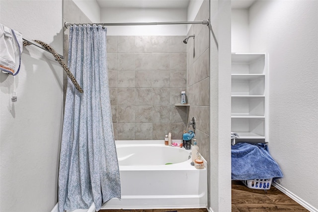 2435 Palmer Lake Ln, Spring, TX 77373 - full bath with shower / tub combo with curtain and wood finished floors