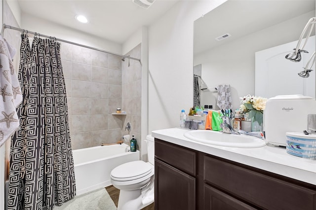 2435 Palmer Lake Ln, Spring, TX 77373 - bathroom featuring vanity, shower / bath combination with curtain, recessed lighting, and wood finished floors