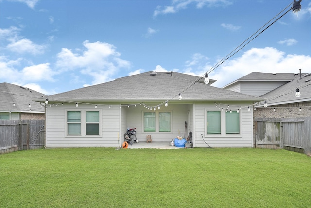 2435 Palmer Lake Ln, Spring, TX 77373 - back of property featuring a fenced backyard, a patio area, and roof with shingles