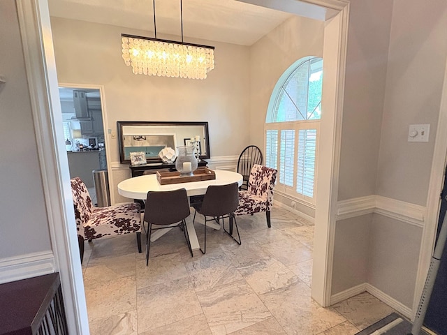 8819 W Rayford Rd, Tomball, TX 77375 - dining room with a chandelier and baseboards