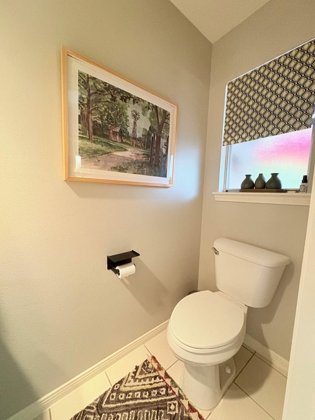 8819 W Rayford Rd, Tomball, TX 77375 - bathroom with tile patterned floors and toilet