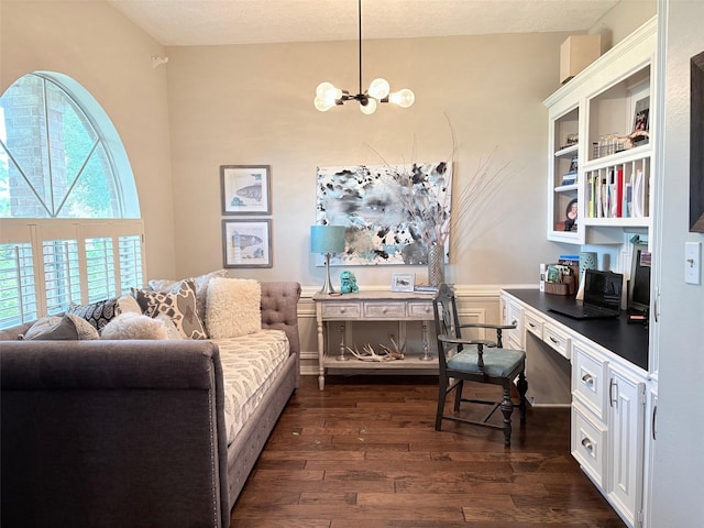 8819 W Rayford Rd, Tomball, TX 77375 - office area with dark wood finished floors, a chandelier, and a textured ceiling