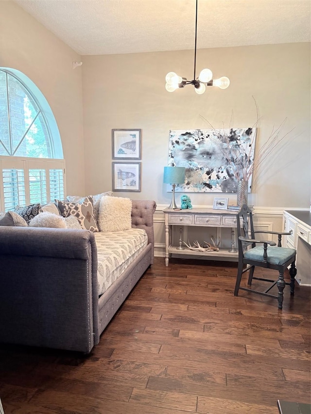 8819 W Rayford Rd, Tomball, TX 77375 - living area featuring a chandelier and dark wood-type flooring