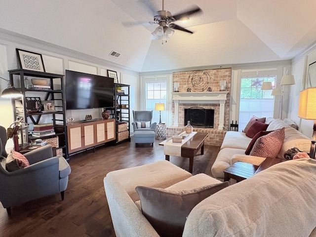 8819 W Rayford Rd, Tomball, TX 77375 - living area with vaulted ceiling, healthy amount of natural light, ceiling fan, dark wood-style floors, and a fireplace