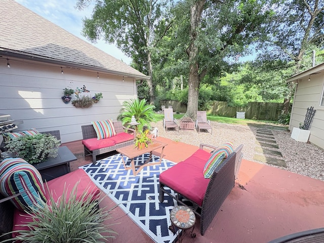 8819 W Rayford Rd, Tomball, TX 77375 - fenced backyard with an outdoor living space and a patio