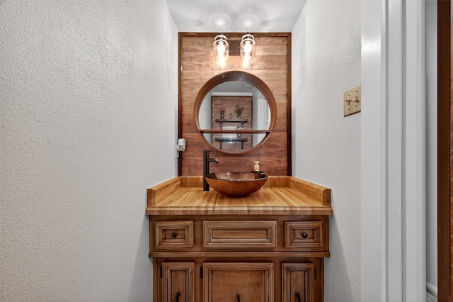 5903 Havenwoods Dr, Houston, TX 77066 - bathroom with vanity and a textured wall