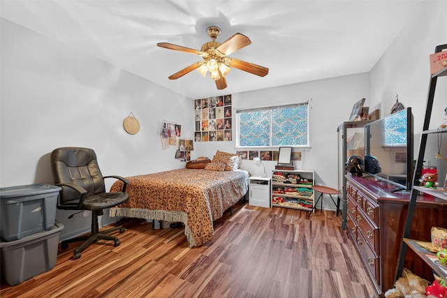 5903 Havenwoods Dr, Houston, TX 77066 - bedroom featuring wood finished floors and ceiling fan