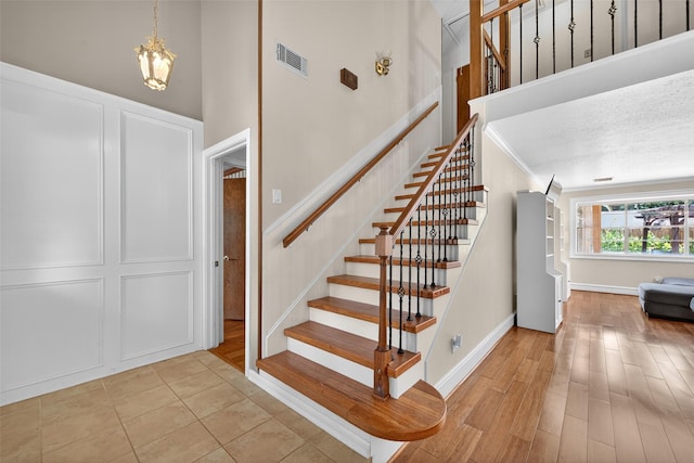 5903 Havenwoods Dr, Houston, TX 77066 - stairs with wood finished floors and baseboards