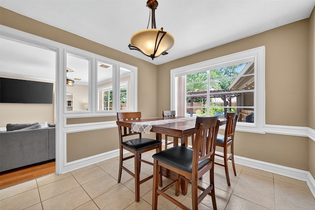 5903 Havenwoods Dr, Houston, TX 77066 - dining room with baseboards and light tile patterned flooring