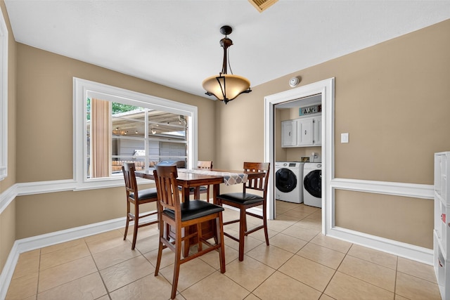 5903 Havenwoods Dr, Houston, TX 77066 - dining space featuring washer and clothes dryer and light tile patterned flooring