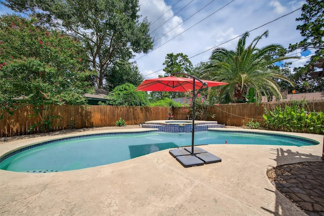 5903 Havenwoods Dr, Houston, TX 77066 - view of swimming pool featuring a fenced backyard, a patio area, and a pool with connected hot tub