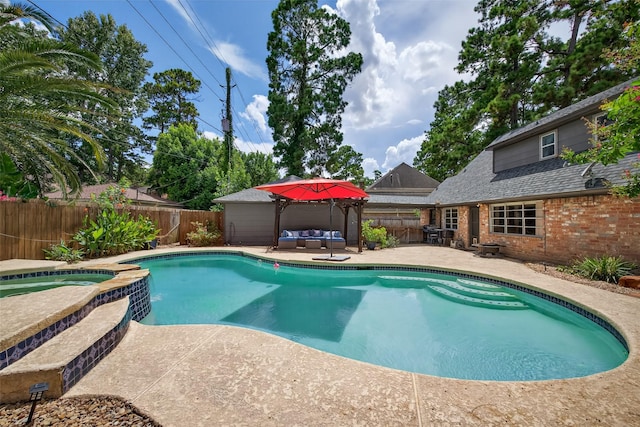 5903 Havenwoods Dr, Houston, TX 77066 - view of swimming pool with a patio, a fenced backyard, a pool with connected hot tub, and a gazebo