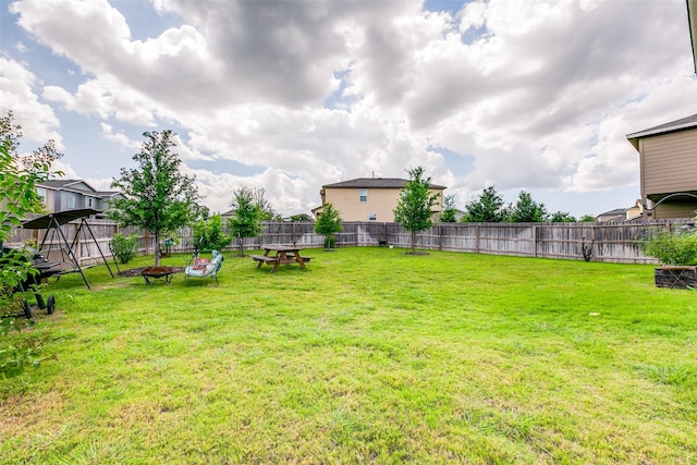 1007 Cozumel Emerald, San Antonio, TX 78253 - fenced backyard with an outdoor fire pit