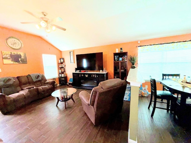 2315 Shady Tree Ln, Conroe, TX 77301 - living area featuring vaulted ceiling, wood finished floors, and ceiling fan