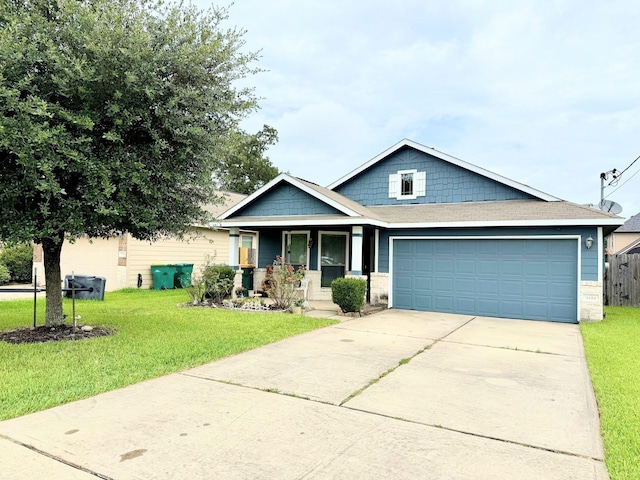 2315 Shady Tree Ln, Conroe, TX 77301 - craftsman-style house featuring a porch, driveway, and an attached garage