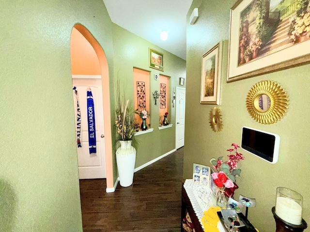 2315 Shady Tree Ln, Conroe, TX 77301 - corridor featuring wood finished floors and arched walkways