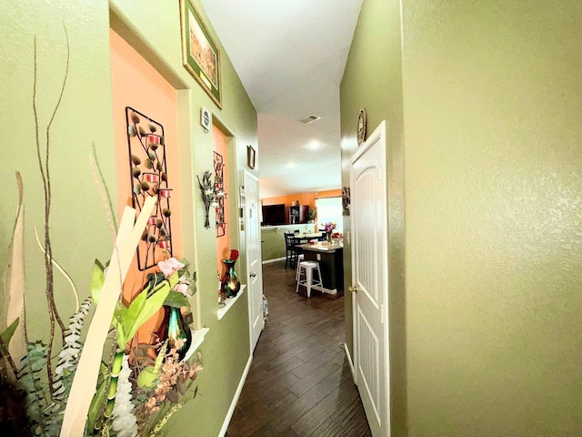 2315 Shady Tree Ln, Conroe, TX 77301 - hall with dark wood-type flooring and baseboards