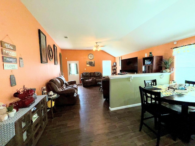 2315 Shady Tree Ln, Conroe, TX 77301 - dining room featuring vaulted ceiling, dark wood-type flooring, and ceiling fan