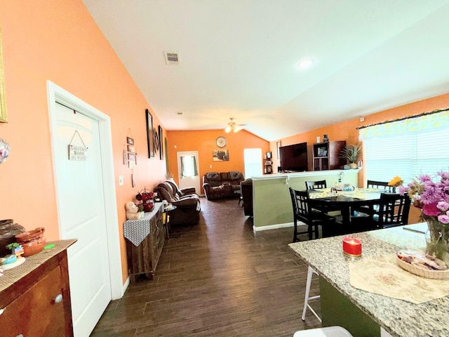 2315 Shady Tree Ln, Conroe, TX 77301 - dining space featuring dark wood-style flooring, lofted ceiling, and ceiling fan